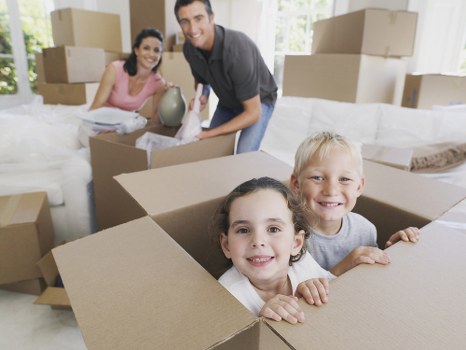Office removals team planning a move in Bow with boxes and furniture
