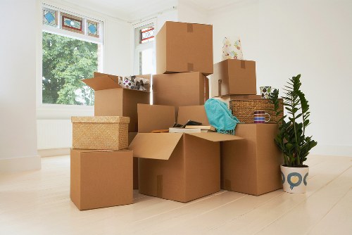 Furniture being carried during a Bow removals service
