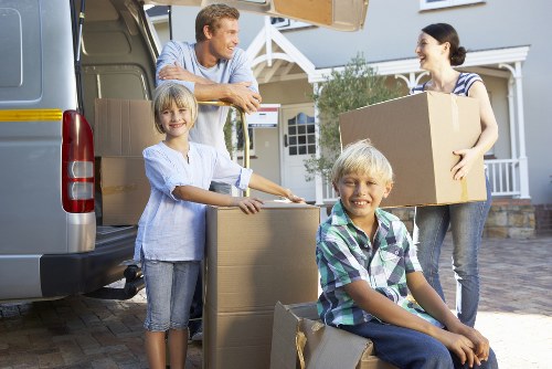 Preparing for a local move in Bow with boxes and furniture ready